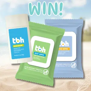 Three TBH Kids skincare products on a beach-themed background: a blue deodorant stick, green spot wipes, and blue face wipes. “WIN!” appears above the Body Refresh Kit with playful white doodle accents surrounding the scene.