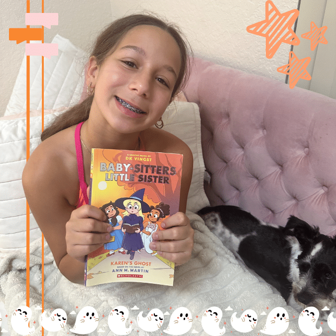 A smiling girl with braces holds “Baby-Sitters Little Sister: Karen’s Ghost” while sitting on a bed beside her black-and-white dog. Decorative stars and dots frame this Bestie Book Club moment.